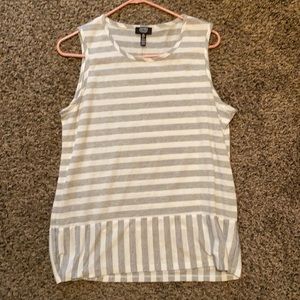 Grey and white sleeveless blouse, size large.